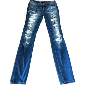 American Eagle Outfitters Super Stretch Jegging Size 0 Distressed Medium Wash